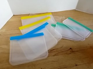 Item #498 — New Reusable Plastic Zipper Bags 10 in largest