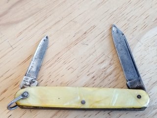 Item #46 — Vintage Yellow Pocket Knife, 8 in open photo 1 of 3