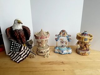 Item #107 — Eagle & Carousel Figurines, some chips photo 1 of 7
