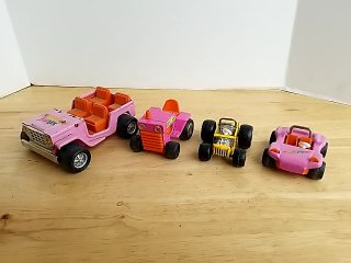 Item #84 — Buddy L toy cars, largest 6 inch long