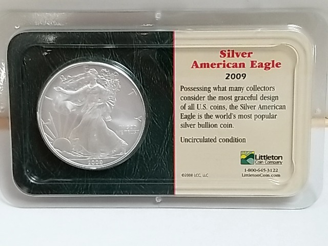 Item #1 — 2009 American Eagle silver dollar photo 1 of 3