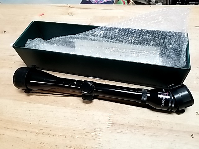 Item #245 — Tasco 4x32mm Rifle Scope photo 1 of 4