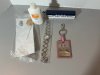 Item #522 — Avon Watch & Unigard Keychain Lot