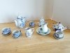 Item #157 — Blue Floral Porcelain Tea Set, tallest approx 4 inch photo 1 of 5