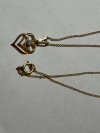 Item #153 — Marked 1/20 14kt gold pendant and chain necklace photo 1 of 4