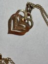 Item #153 — Marked 1/20 14kt gold pendant and chain necklace photo 4 of 4