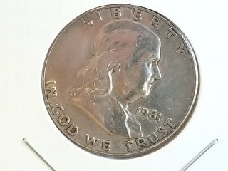 Item #16 — 1961 Franklin Half Dollar D