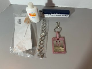 Item #522 — Avon Watch & Unigard Keychain Lot photo 1 of 4