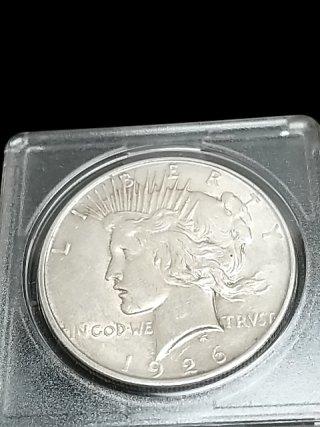 Item #10 — 1926 D Silver Peace Dollar photo 1 of 2