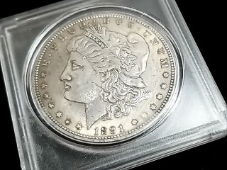 Item #65 — 1891 O Morgan Silver Dollar photo 1 of 2