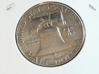 Item #16 — 1961 Franklin Half Dollar D photo 2 of 2