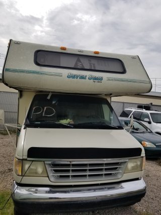 Item #1 — 1993 White Ford Econoline	26-00299 photo 2 of 5