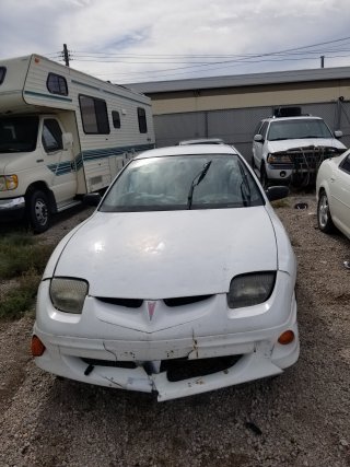 Item #5 — 2001 White Pontiac Sunfire	26-01959 photo 2 of 5