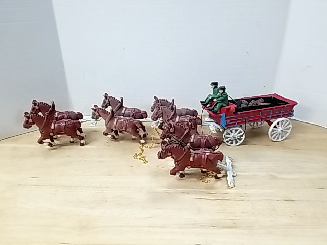 Item #15 — CAST iron horse and buggy, approx 5 inch tall photo 1 of 9