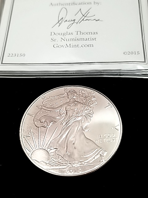 Item #102 — 2015 American Silver Eagle Coin photo 1 of 3
