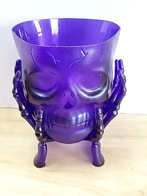 Item #57 — New Purple Skull Hands candy dish photo 1 of 2