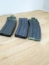 Item #54 — Metal .223 gun clips, each holds 30 rounds photo 3 of 3