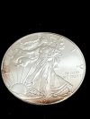 Item #12 — 2014 American Eagle silver dollar photo 1 of 2