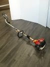 Item #11 — HOMELITE Mighty Lite 26e gas trimmer photo 1 of 8