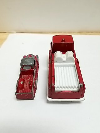 Item #30 — Old toy trucks, largest approx 4 inch photo 5 of 5