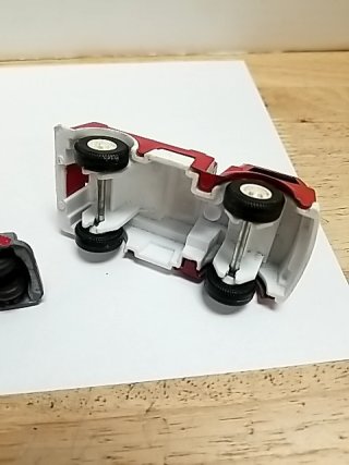 Item #30 — Old toy trucks, largest approx 4 inch photo 3 of 5
