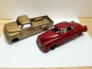 Item #106 — Vintage Toy Cars Missing 2 tires, largest 6 inch photo 1 of 6