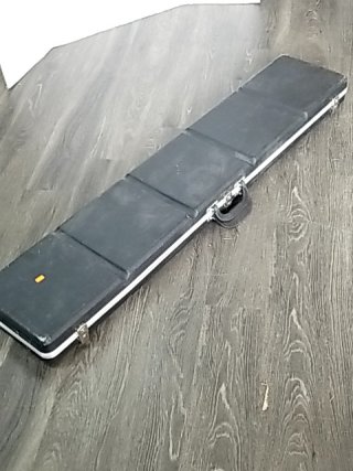 Item #44 — Black Hard Shell gun Case 52 by 10 by 4 inch