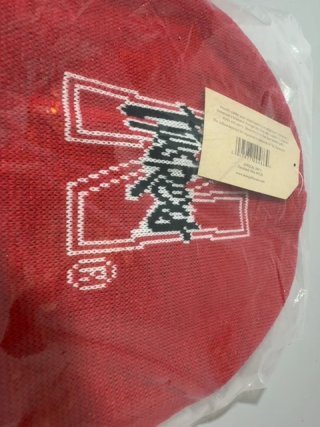 Item #206 — Red Husker Beanie in Plastic Sealed photo 2 of 4