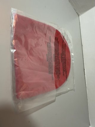 Item #209 — Red Stussy Beanie in Plastic Sealed photo 4 of 4