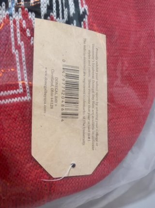 Item #206 — Red Husker Beanie in Plastic Sealed photo 3 of 4