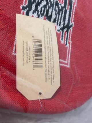 Item #209 — Red Stussy Beanie in Plastic Sealed photo 3 of 4