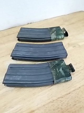Item #54 — Metal .223 gun clips, each holds 30 rounds photo 2 of 3
