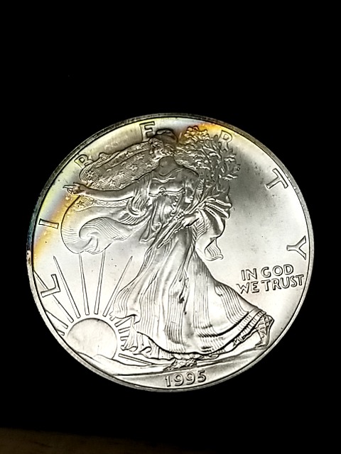 Item #33 — 1995 American Eagle Silver dollar photo 1 of 2