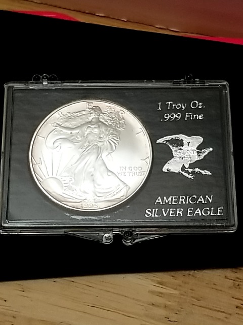 Item #72 — 1995 American Eagle Silver Dollar photo 1 of 3