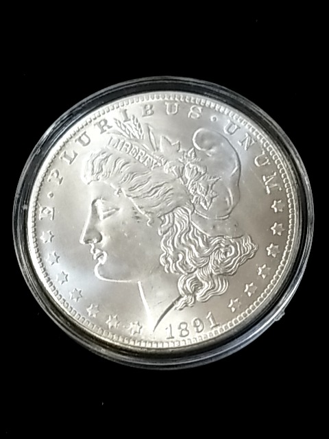 Item #81 — 1891 CC Morgan Silver Dollar Coin, RARE photo 1 of 2