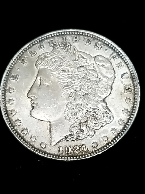 Item #95 — 1921 Morgan silver dollar photo 1 of 2