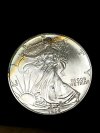 Item #33 — 1995 American Eagle Silver dollar photo 1 of 2