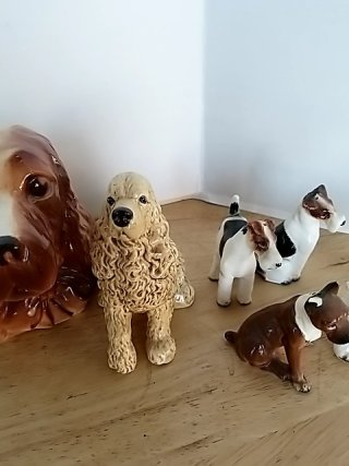 Item #402 — Dog figurine collection Most have damage photo 6 of 7