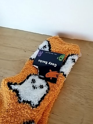 Item #201 — New Orange Ghost Fuzzy Socks Size 4-10 photo 2 of 2