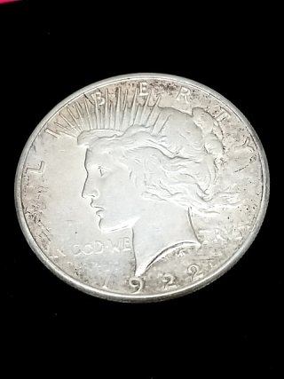 Item #41 — 1922 S Peace Silver Dollar photo 1 of 2