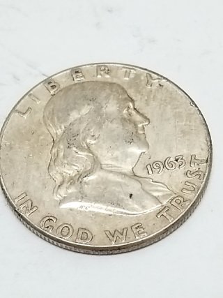 Item #125 — 1963 Silver Franklin Half Dollar