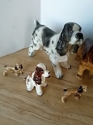Item #402 — Dog figurine collection Most have damage photo 2 of 7