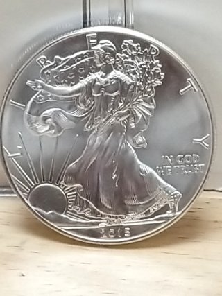 Item #40 — 2015 American Eagle Silver Dollar with COA photo 2 of 3