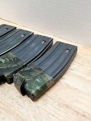 Item #4 — Metal .223 REM magazines, each holds 30 photo 3 of 4