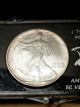 Item #72 — 1995 American Silver Eagle Coin photo 2 of 3
