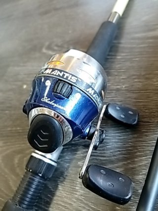 Item #154 — Fishing Rods with Reels photo 2 of 8