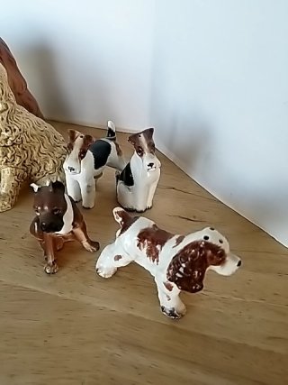 Item #402 — Dog figurine collection Most have damage photo 7 of 7