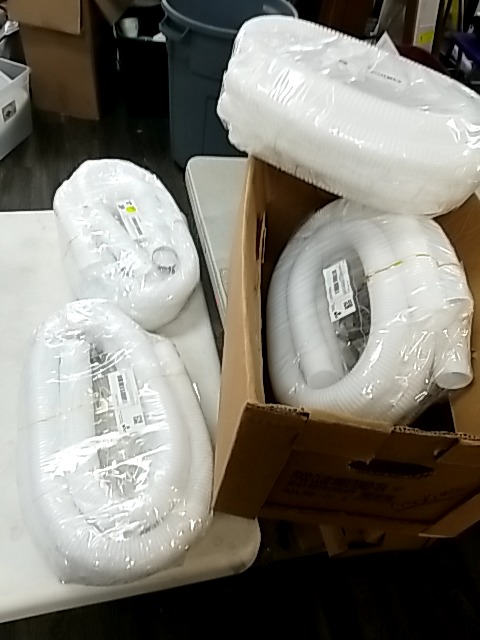 Item #466 — New White Flexible Drain Hoses photo 1 of 3