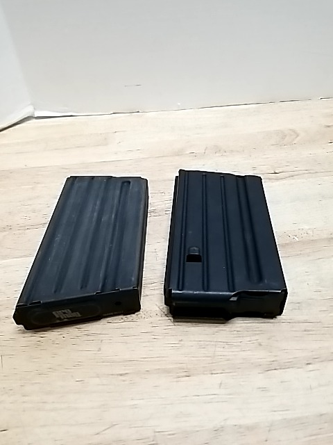 Item #105 — Two 7.62 metal magazines, each 6 inch long photo 1 of 2