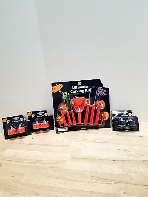 Item #75 — New Halloween Pumpkin Carving Kit Set and tea lights photo 1 of 4